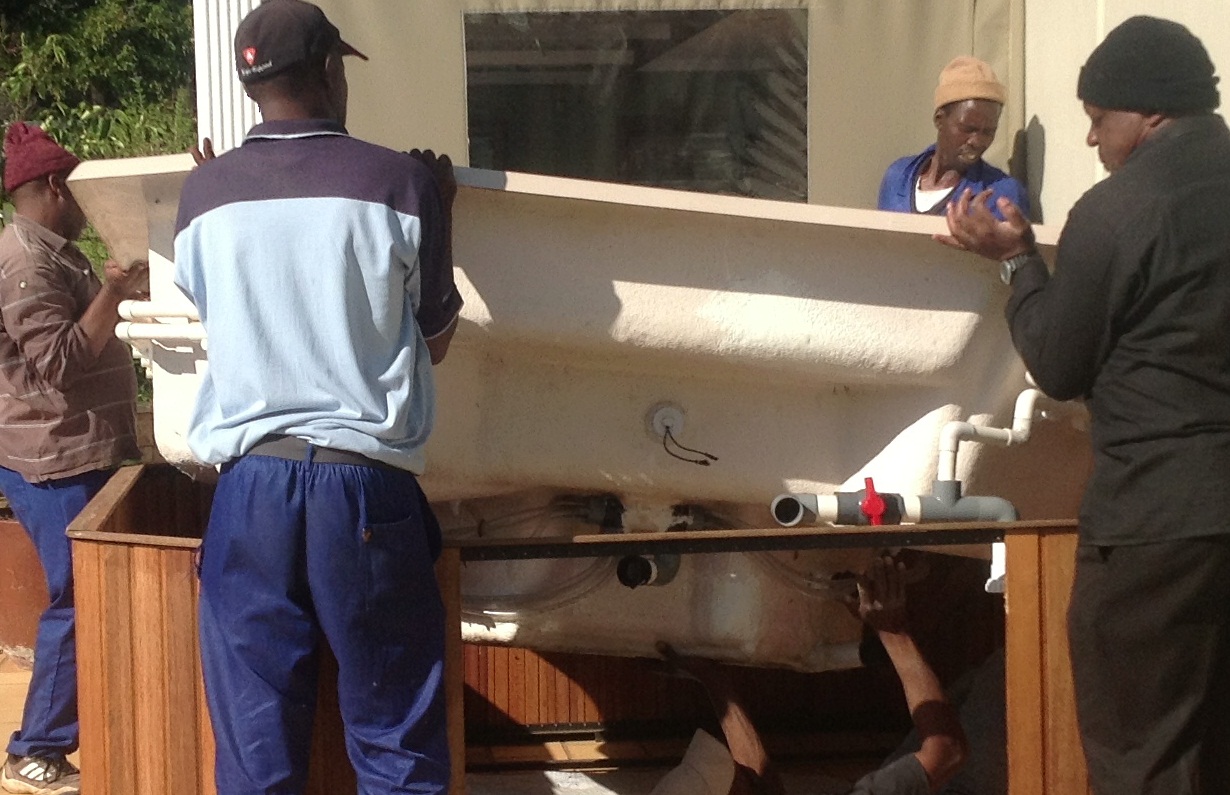 10 Seater Square Jacuzzi placed in meranti wooden surround